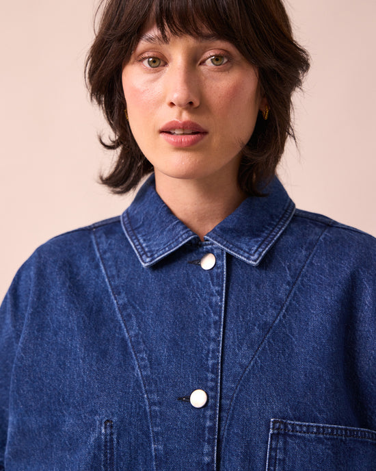 model wears bea mid blue denim jacket