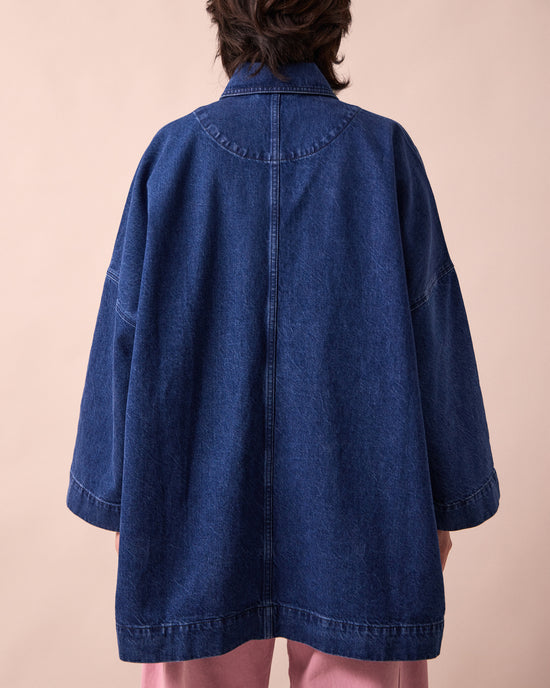 model wears bea mid blue denim jacket