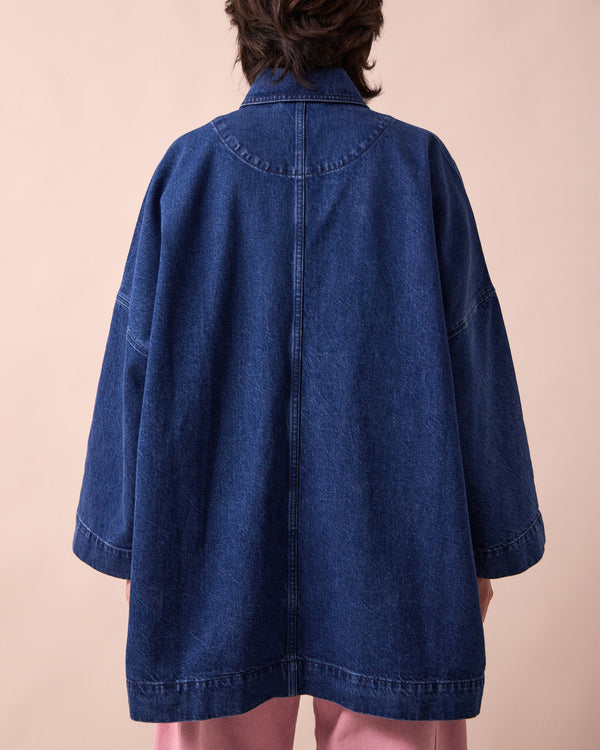 model wears bea mid blue denim jacket