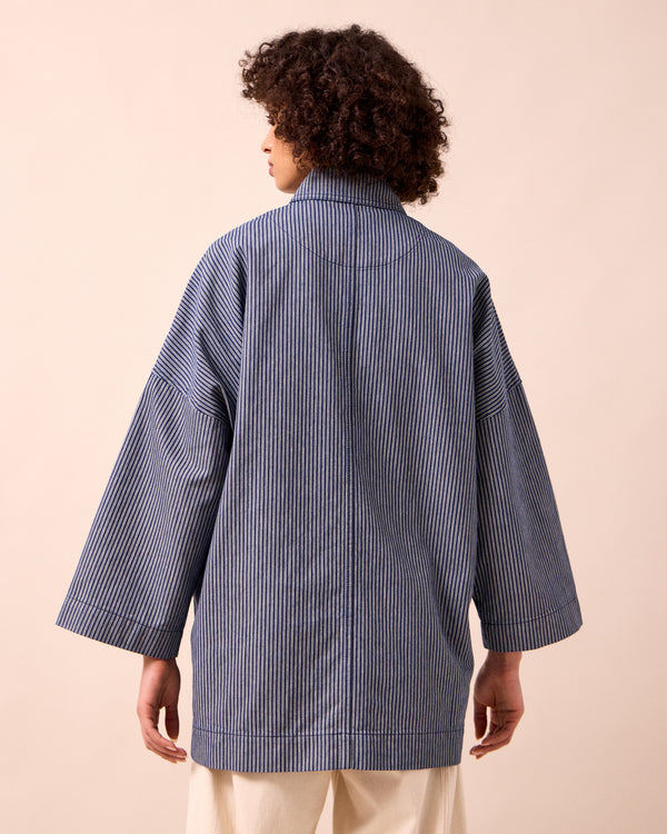 model wears bea navy hickory stripe denim jacket