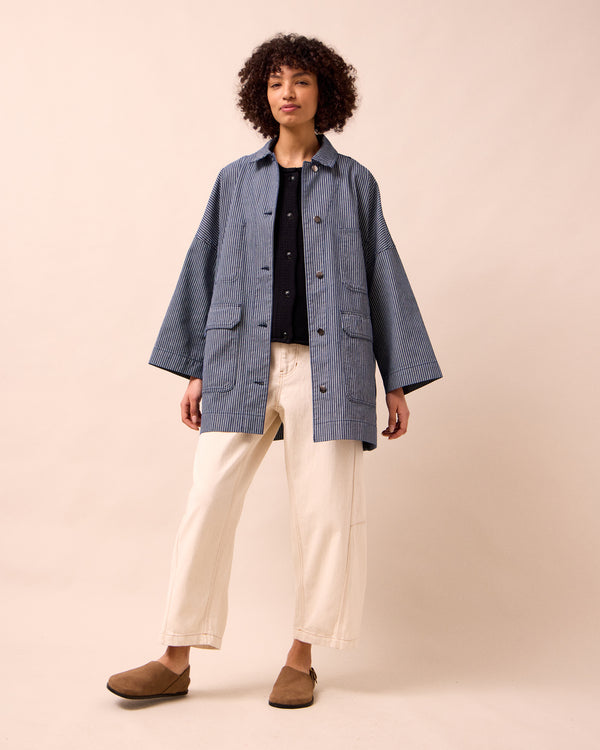 model wears bea navy hickory stripe denim jacket