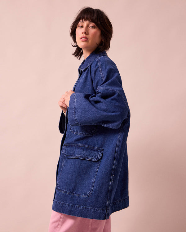 model wears bea mid blue denim jacket