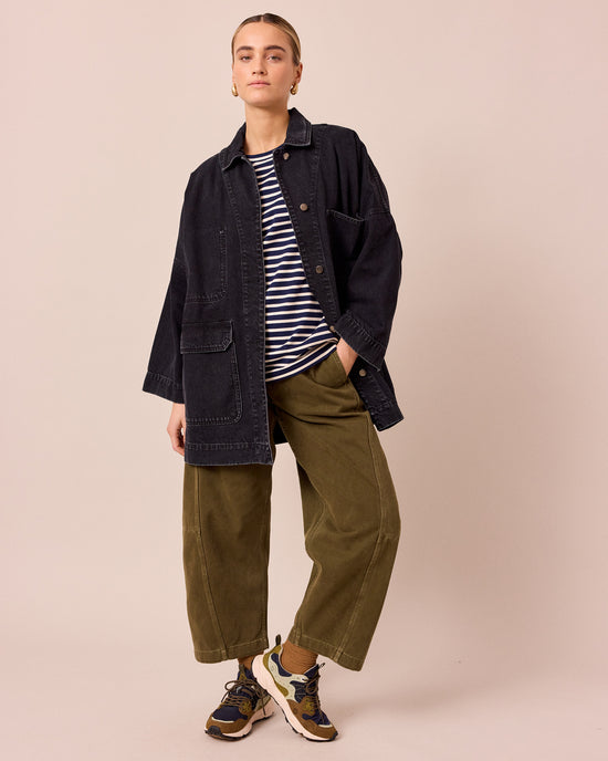 model wears bea washed black denim jacket