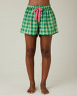 model wears green multi check bed shorts