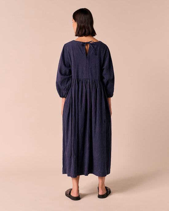 model wears berlin midnight pinstripe cotton dress