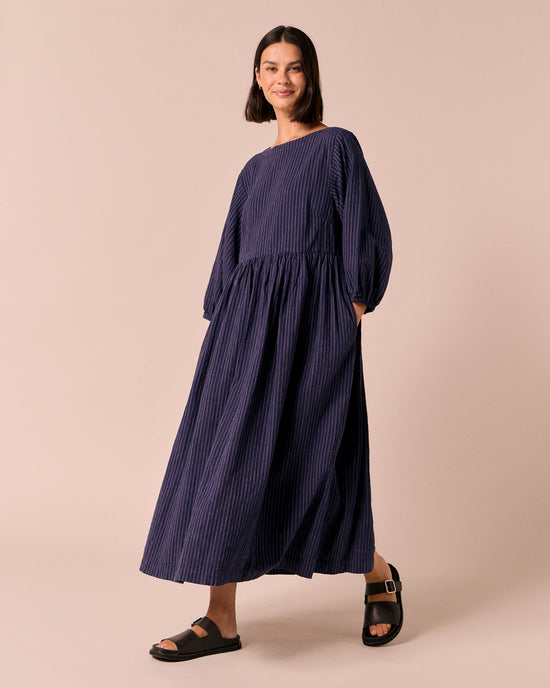 model wears berlin midnight pinstripe cotton dress