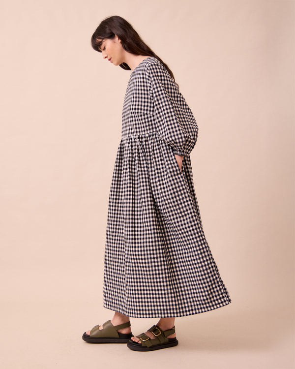 model wears berlin black and ecru gingham seersucker dress