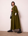 model wears berlin fresh olive mini gingham linen dress