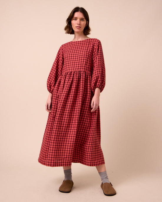 model wears berlin deep rose gingham linen dress