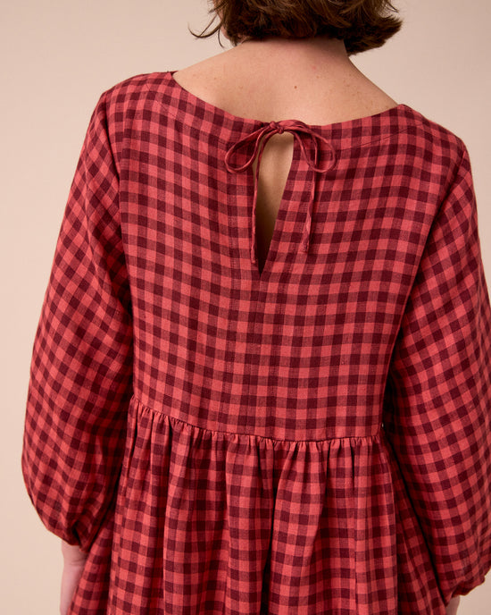 model wears berlin deep rose gingham linen dress