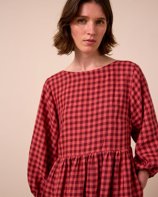 model wears berlin deep rose gingham linen dress