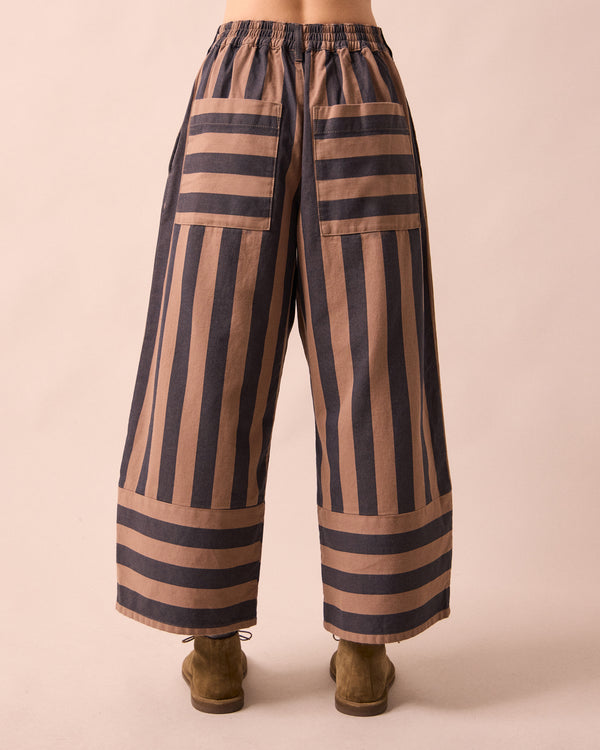 model wears blair graphite and mocha denim jeans back 