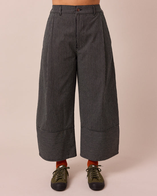 model wears blair black hickory stripe denim jeans front