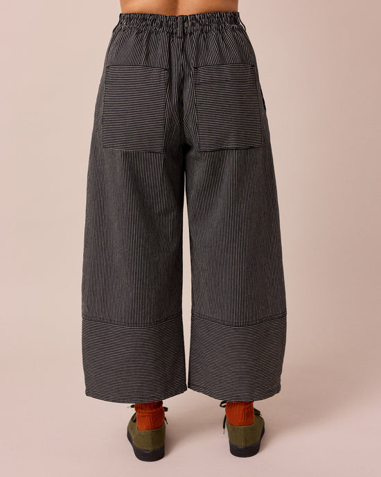 model wears blair black hickory stripe denim jeans back