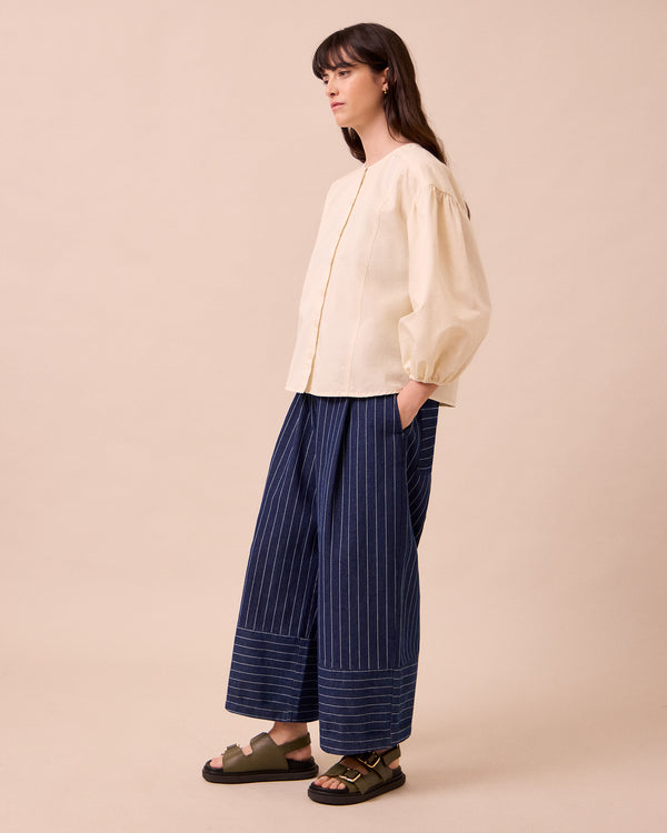 model wears blair mid blue pinstripe denim jeans right