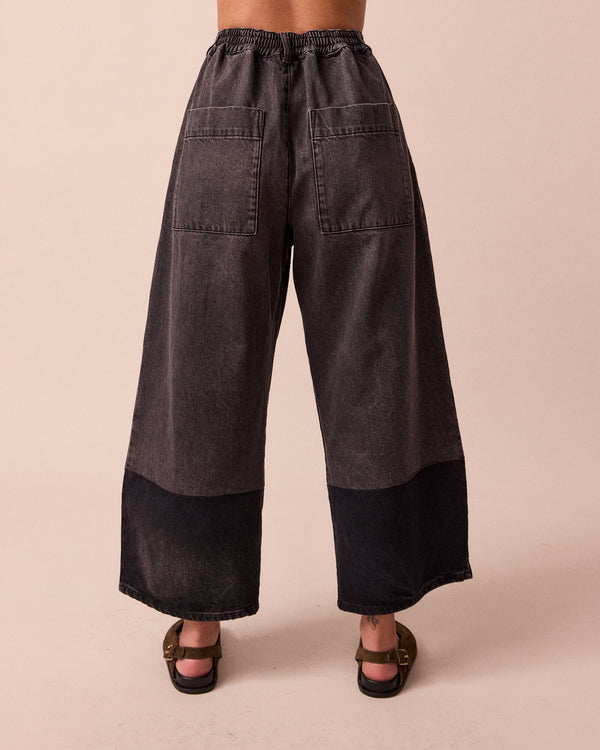 model wears blair grey denim jeans back