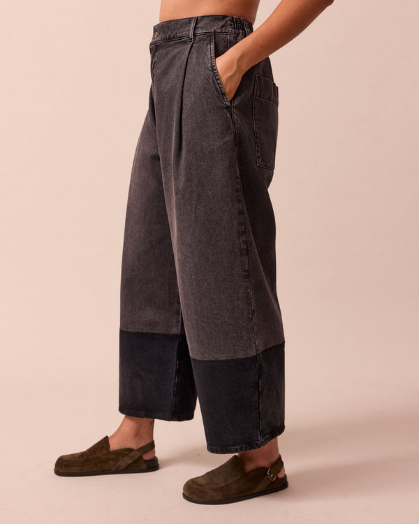 model wears blair grey denim jeans left