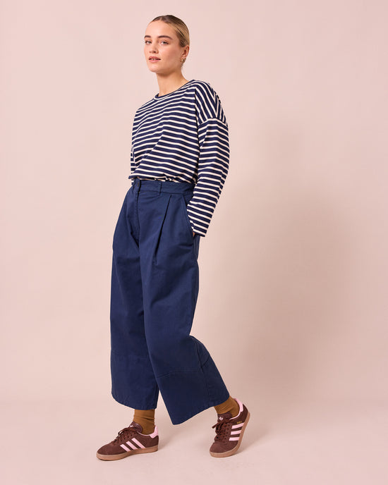 model wears blair ink denim jeans right