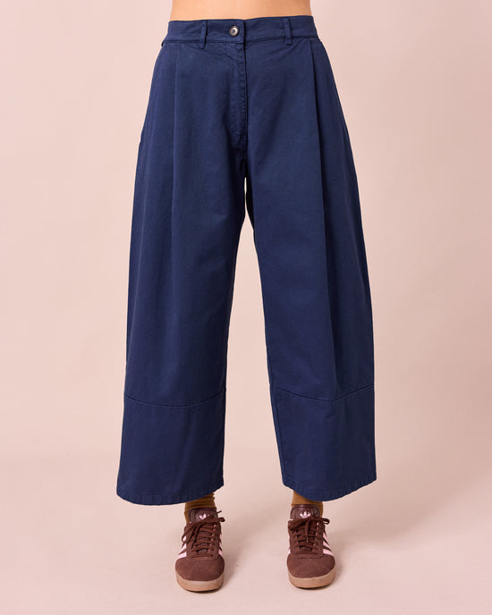 model wears blair ink denim jeans front