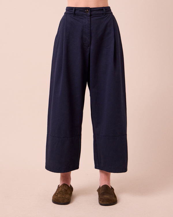 model wears blair ink twill trousers front