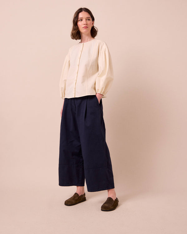 model wears blair ink twill trousers right