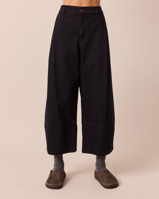 model wears blair washed black denim jeans front