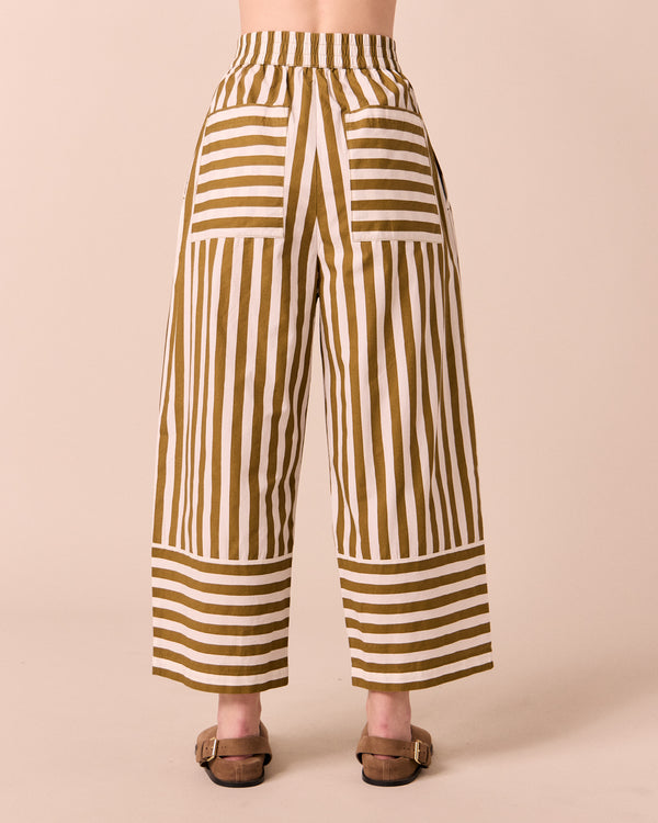 model wears bobbi dune stripe cotton trousers back
