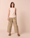 model wears bobbi dune stripe cotton trousers right