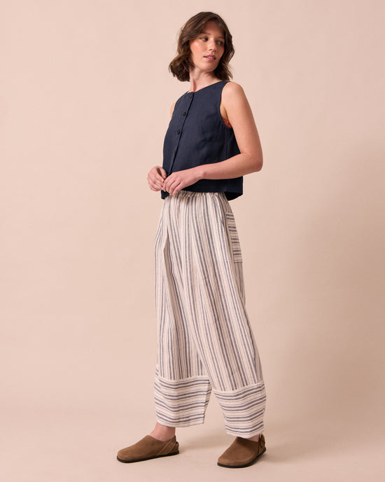 model wears bobbi sailor stripe linen trousers right