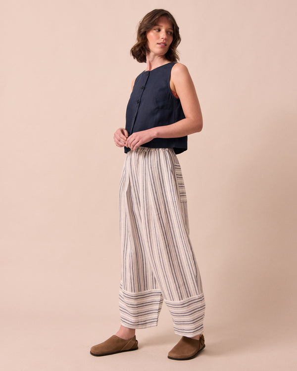 model wears bobbi sailor stripe linen trousers right