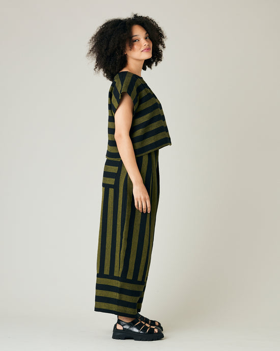 model wears black and olive stripe bobbi trousers