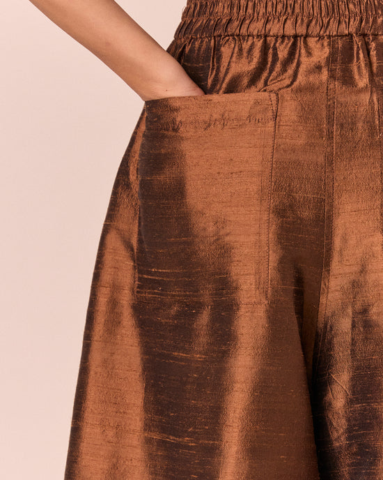 model wears bobbi pecan silk dupion trousers