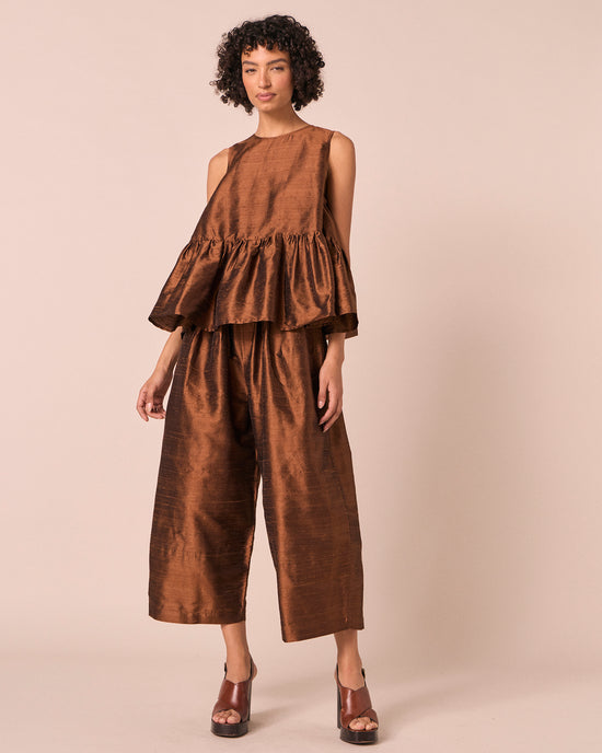 model wears bobbi pecan silk dupion trousers left