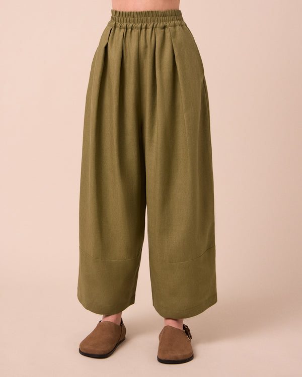 model wears bobbi khaki linen trousers front