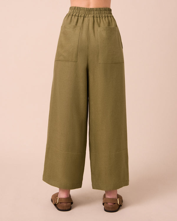 model wears bobbi khaki linen trousers back
