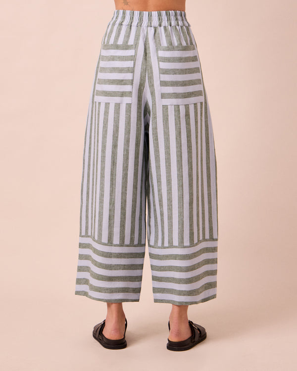 model wears bobbi aloe stripe linen trousers back