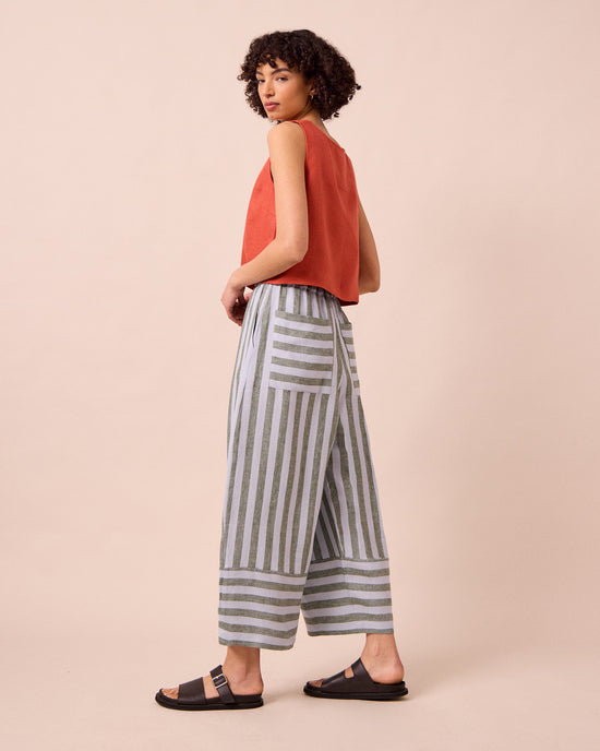 model wears bobbi aloe stripe linen trousers right