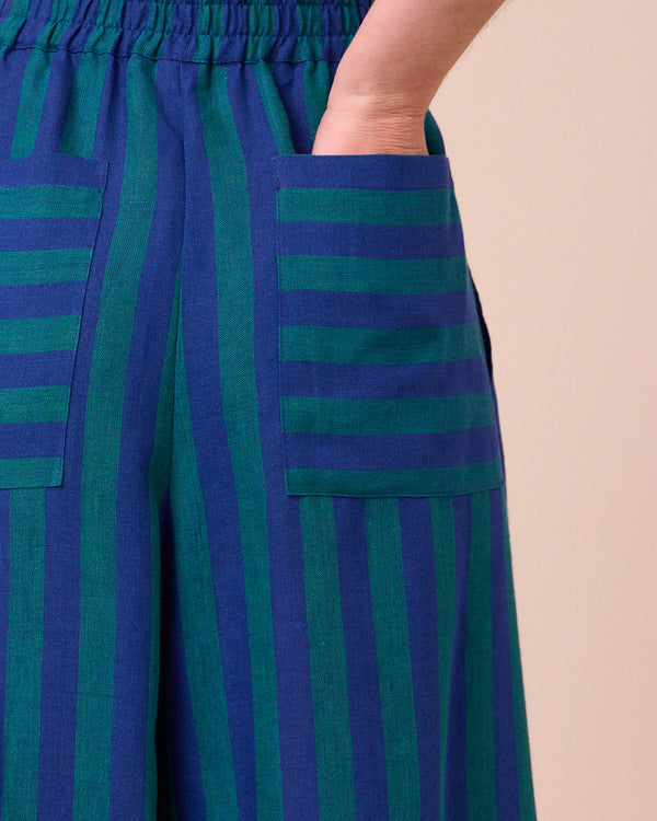 model wears bobbi house blue linen trousers 