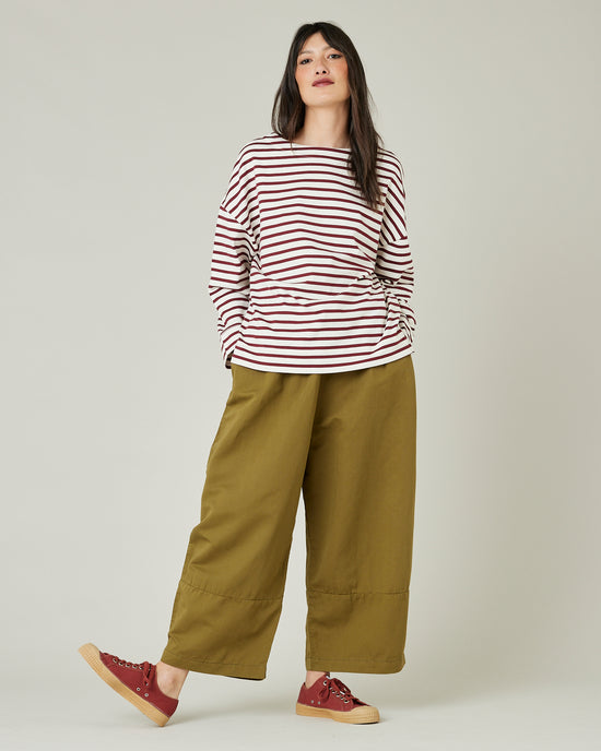 model wears Sicilian green twill bobbi trousers 