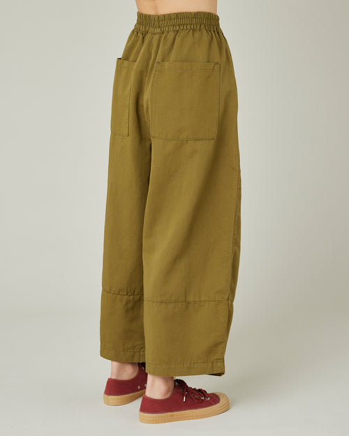 model wears Sicilian green twill bobbi trousers right