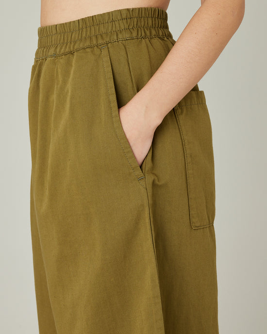 model wears Sicilian green twill bobbi trousers 