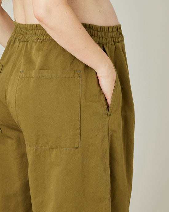 pregnant model wears Sicilian green twill bobbi trousers 