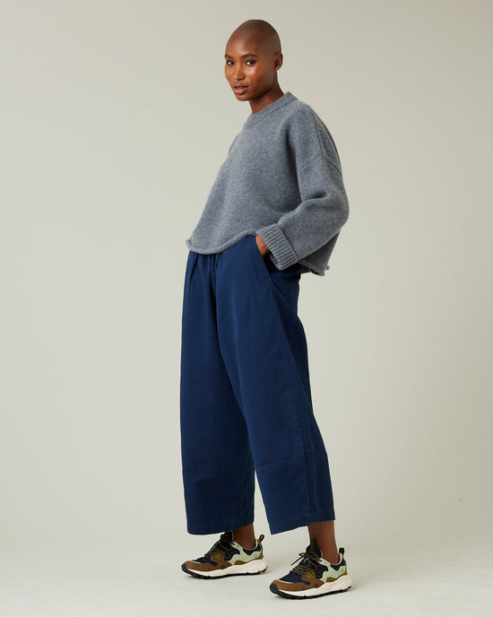 model wears navy twill bobbi trousers