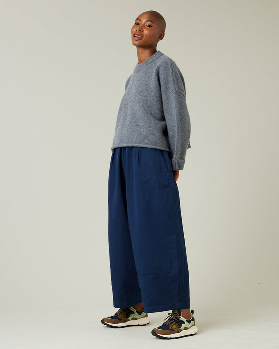 model wears navy twill bobbi trousers