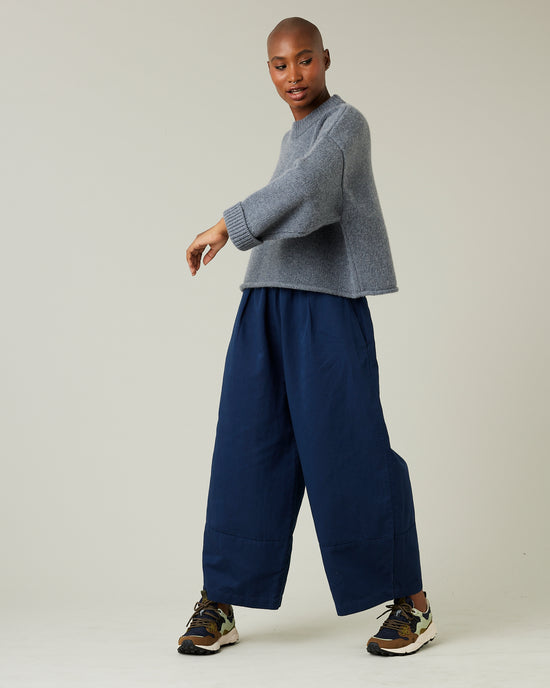 model wears navy twill bobbi trousers