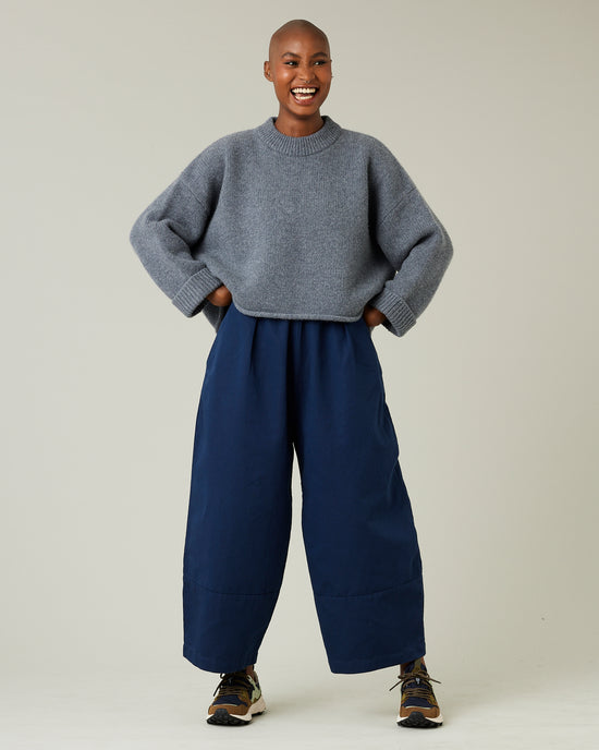 model wears navy twill bobbi trousers