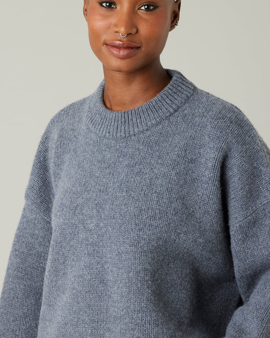 model wears charcoal coco knitted jumper