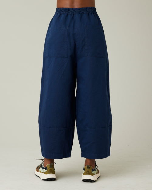 model wears navy twill bobbi trousers back