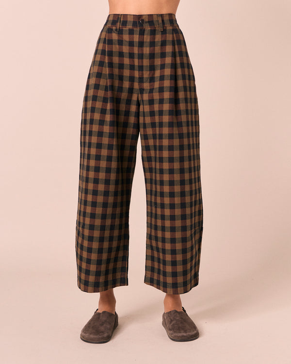 model wears bonnie chestnut check denim jeans front