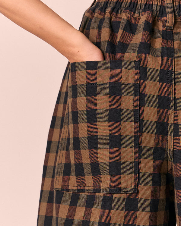 model wears bonnie chestnut check denim jeans